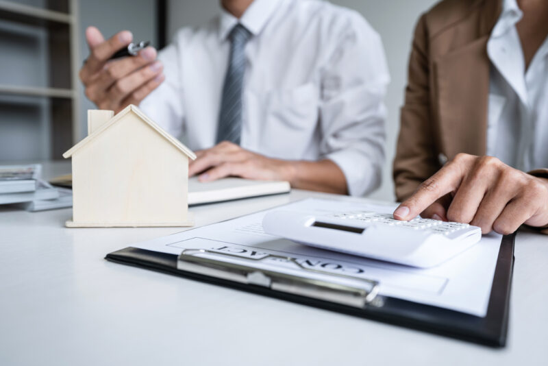 Real estate broker agent presenting and consult to customer to d